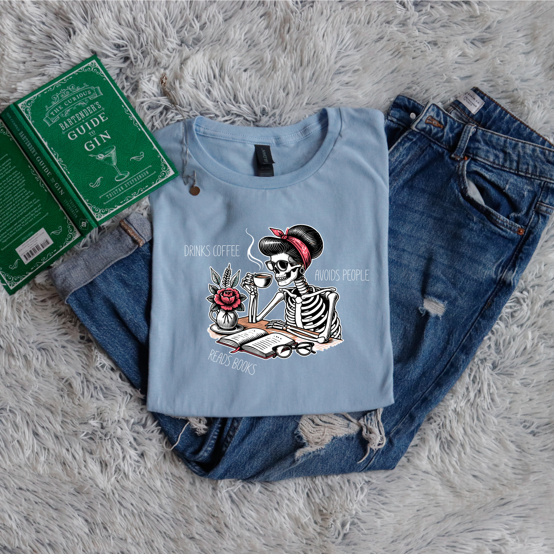 Drinks coffee, avoids people, reads books