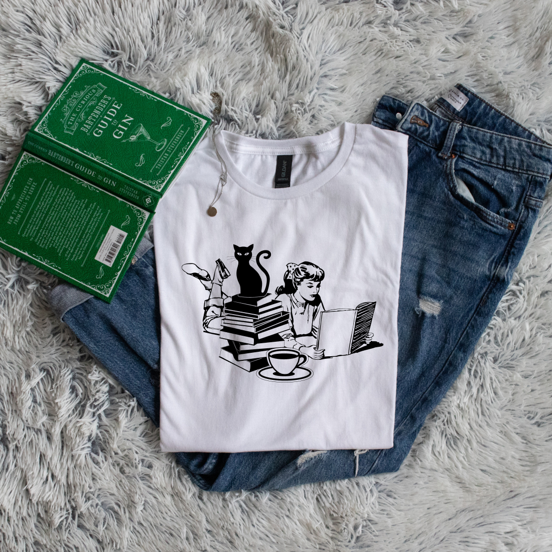 Cat, girl and books