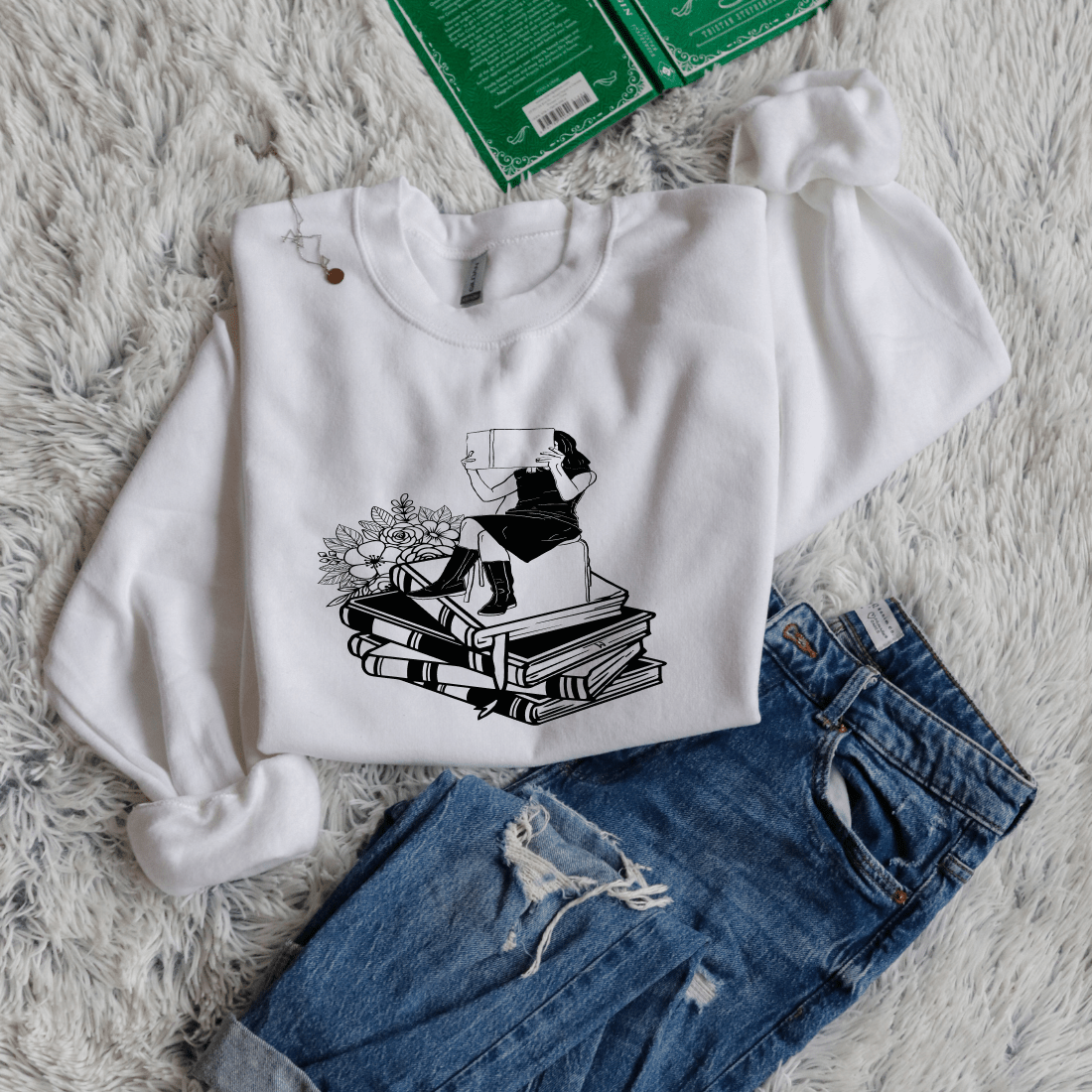 Girl Sitting On Books Reading Flowers - Bookish Wardrobe