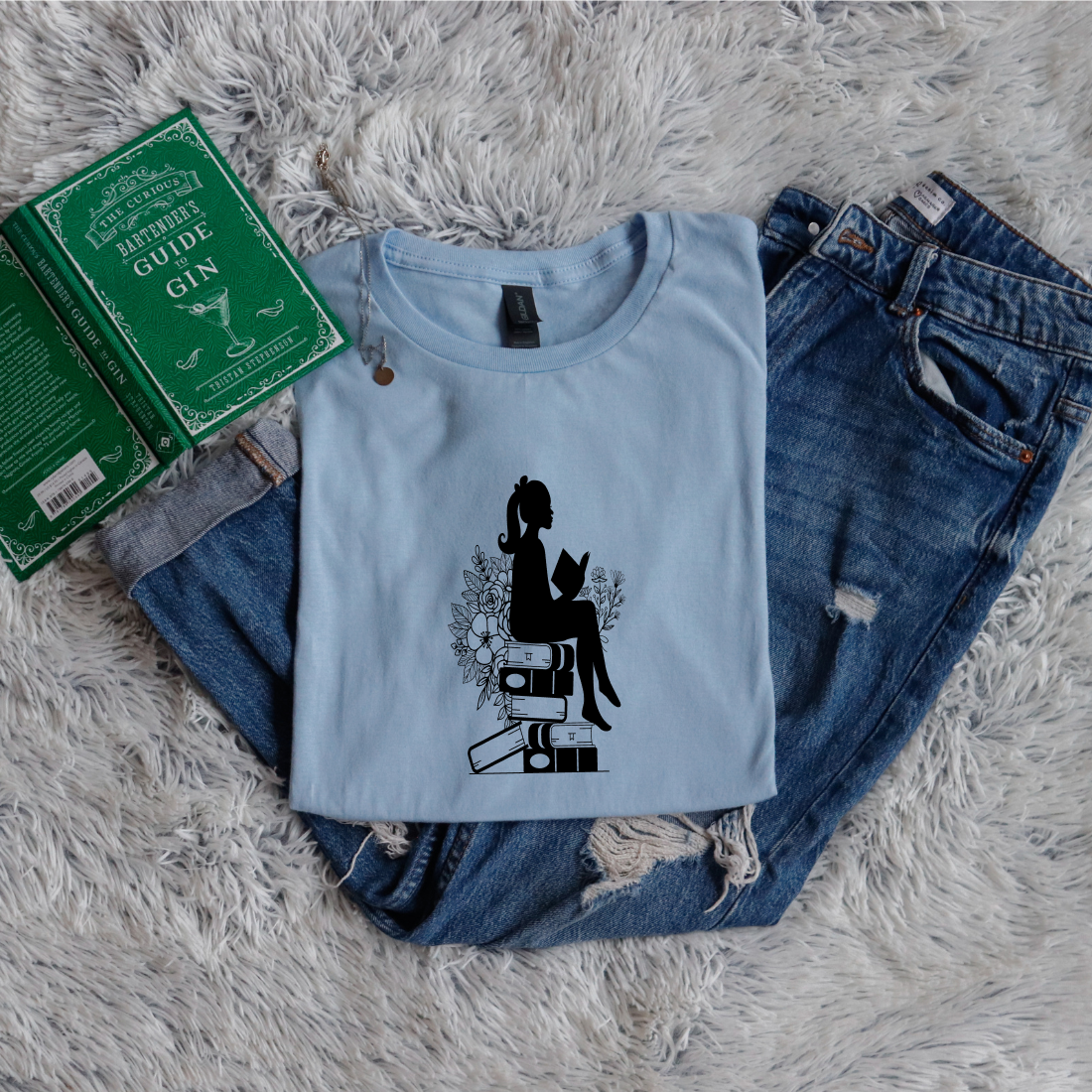 Girl shadow sitting on books reading