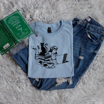 Cat, girl and books