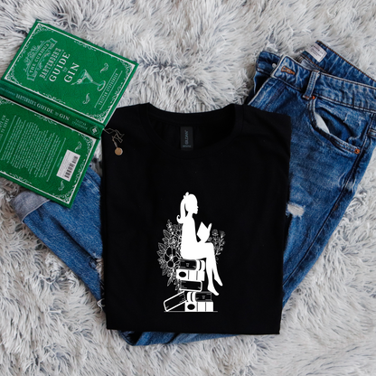 Girl shadow sitting on books reading